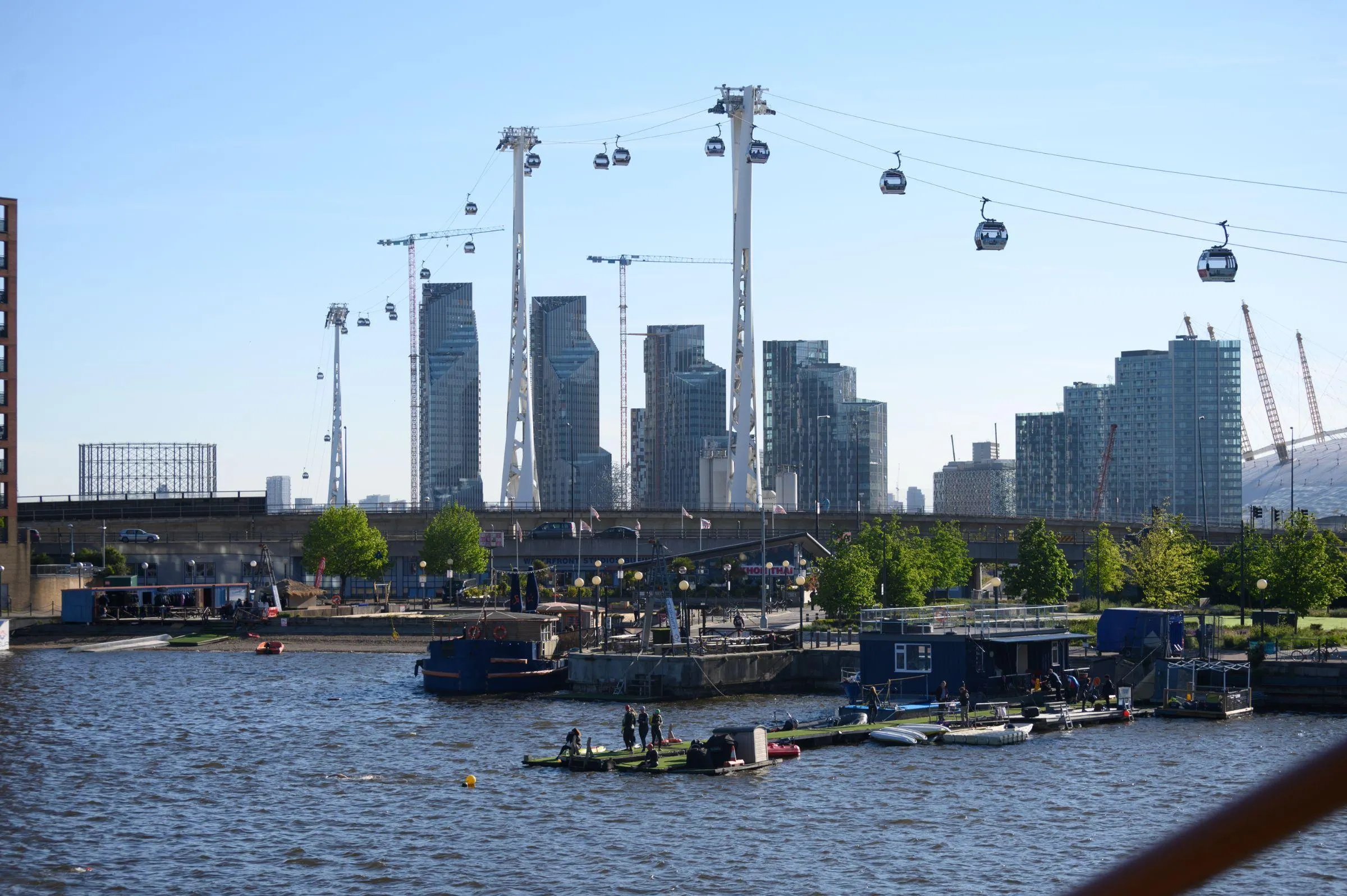View across Royal Victoria Dock towards the IFS Cloud Cable Car and Canary Wharf skyline