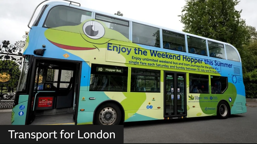 A TfL bus decorated with Weekend Hopper branding, advertising unlimited weekend bus and tram journeys for the price of a single fare