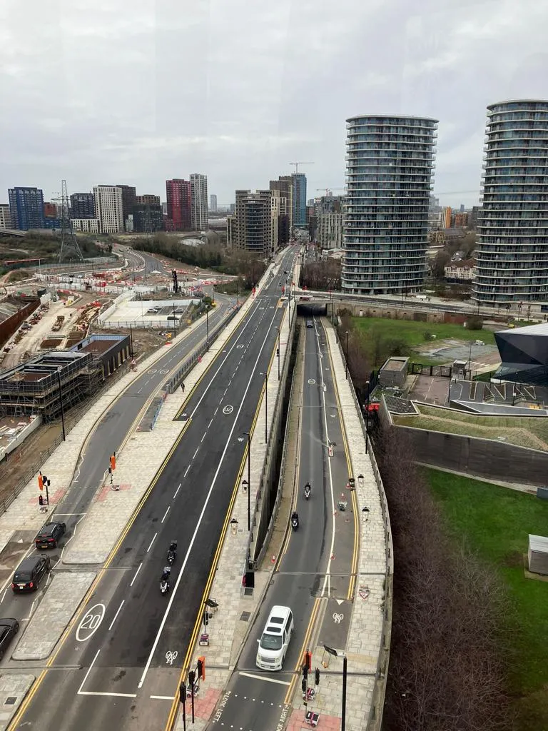 Traffic moving along Silvertown Way, a residential street in Canning Town South