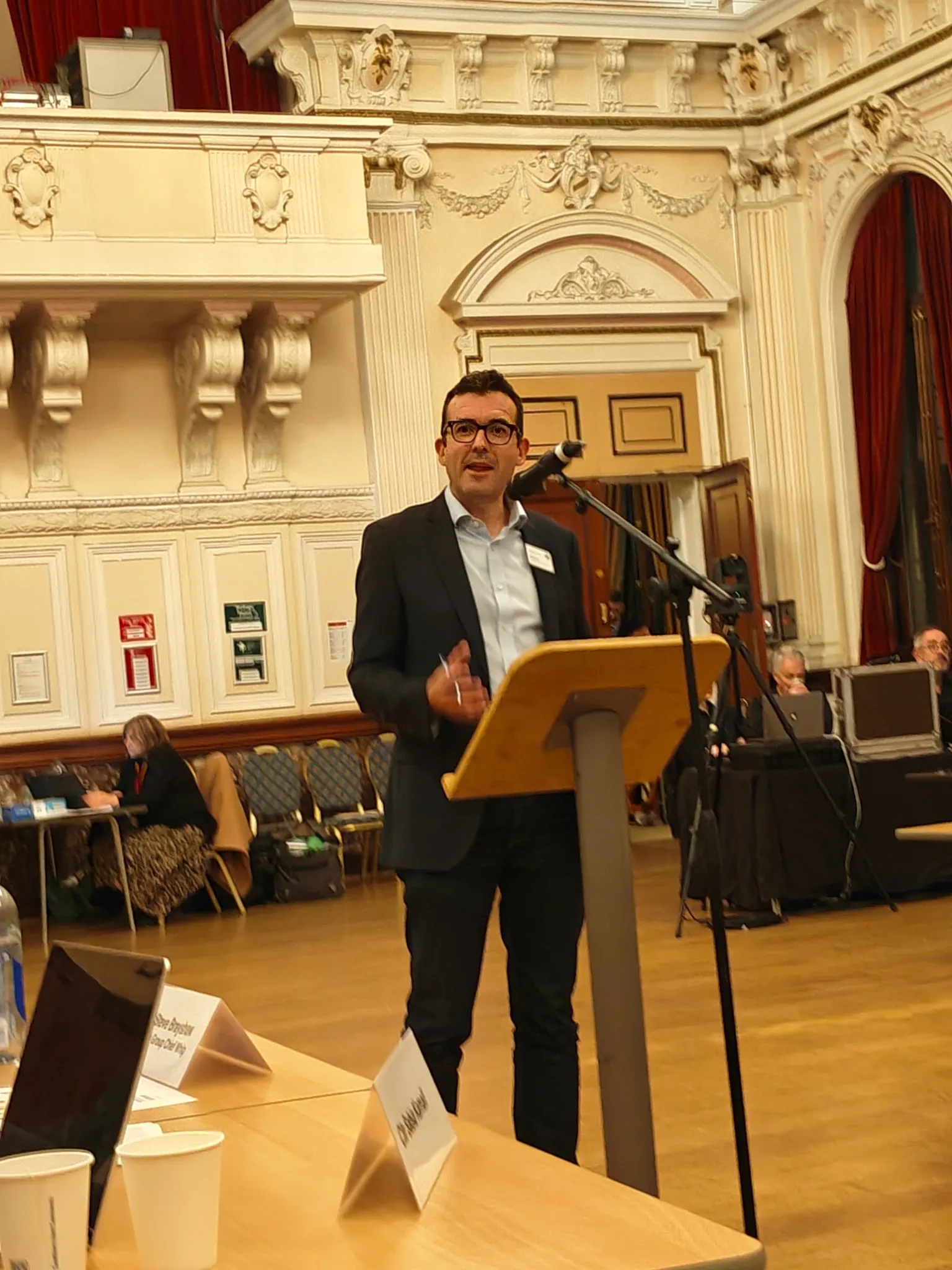 Cllr John Morris addressing the chamber ahead of Dr Will Norman's speech to Newham Council